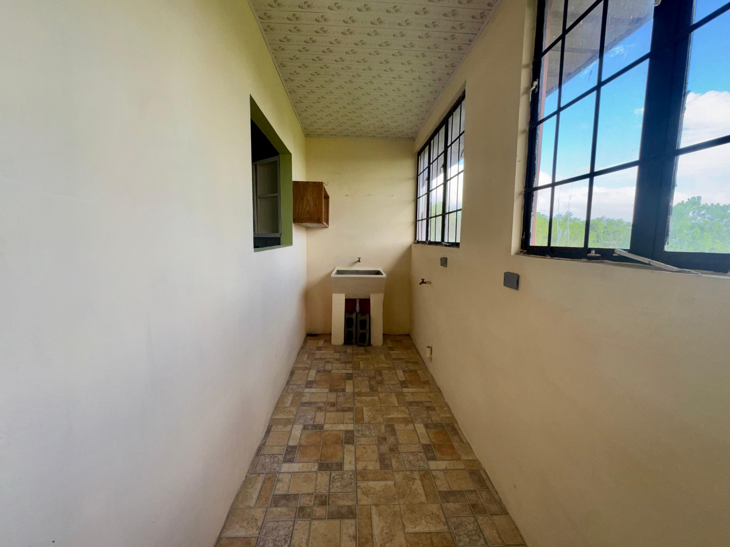 Chaguanas, Joyce Road, Mountain View Park, Lt 42y – Top Floor Unit Laundry Area Chaguanas Apartments